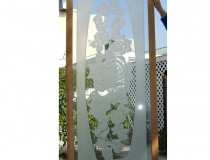 etched window panel with floral pattern
